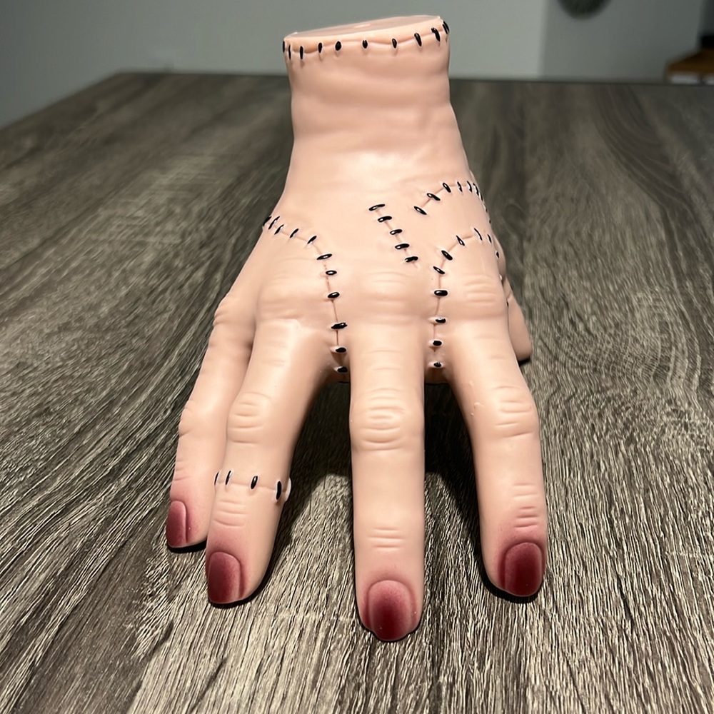 Wednesday Addams hand Thing cosplay.